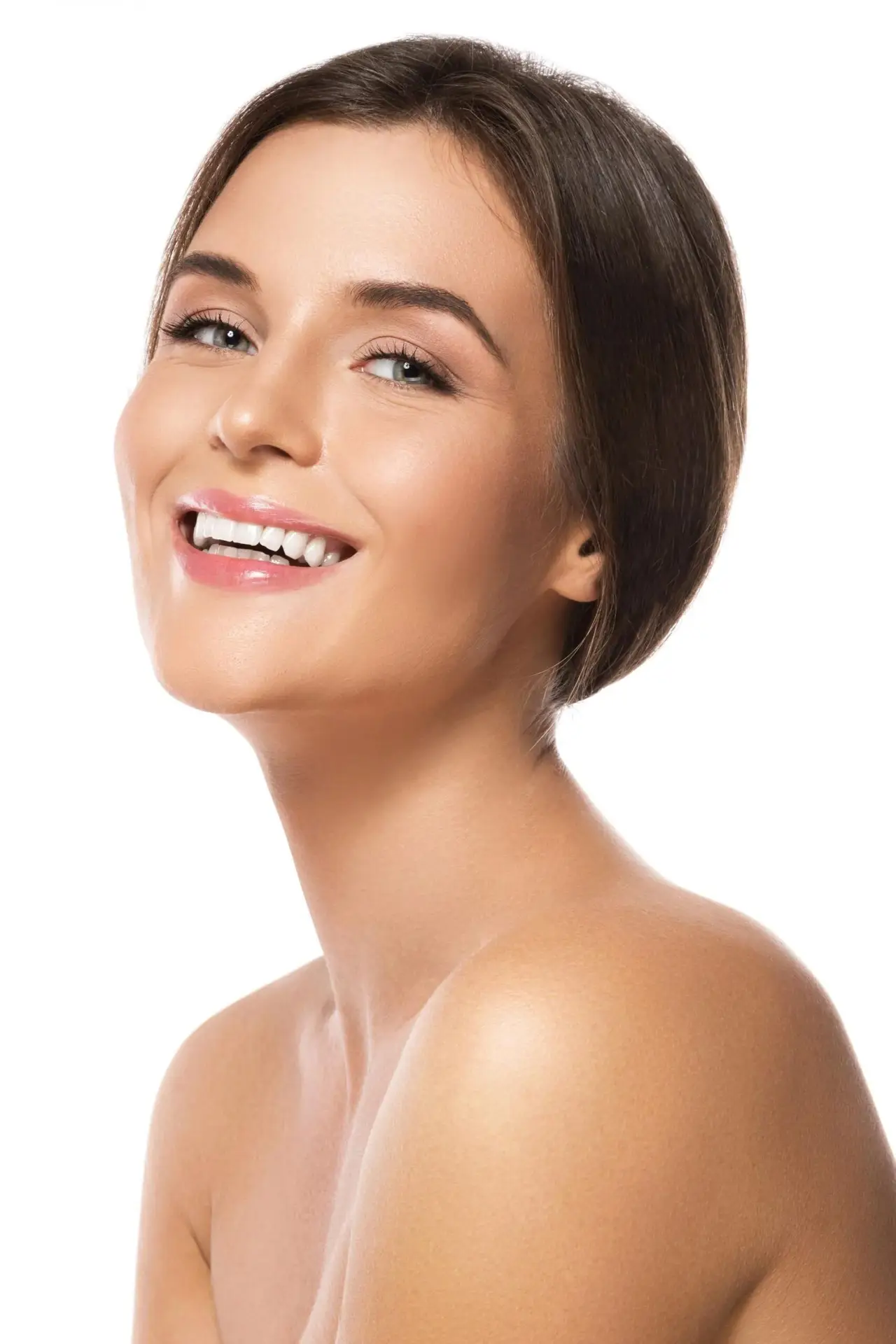 A close up of a woman 's face with a smile on her face.